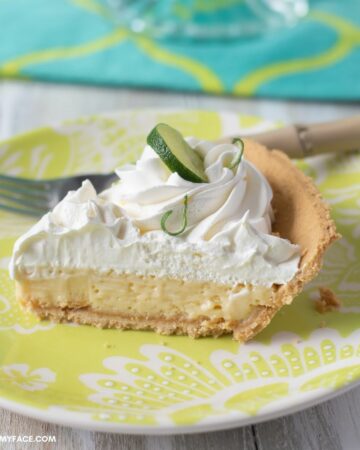 A slice of key lime pie on a plate.