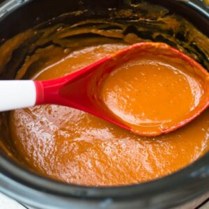 Overhead photo of butternut squash in a crock pot after it has