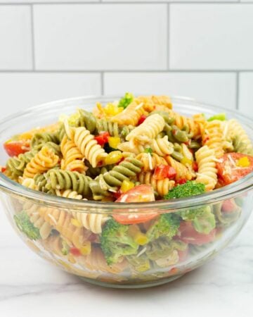 Easy Italian Pasta Salad served in a large glass serving bowl.